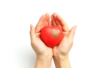 red heart in hands