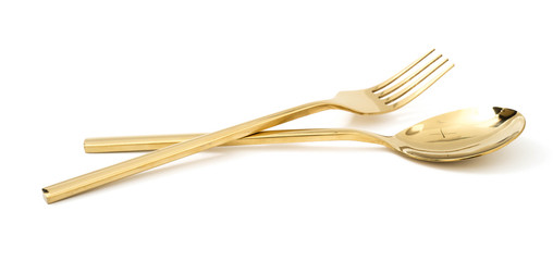 golden spoon and fork isolated on a white