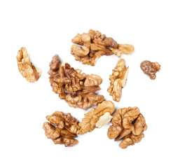 Fototapeta premium A pile of walnut kernels isolated on white background