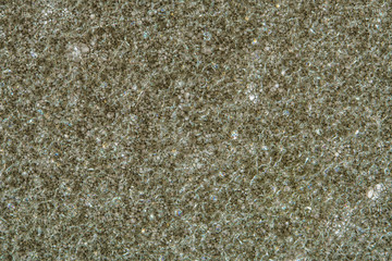 Sponge Foam Texture Macro Background. Abstract background of a thin layer of foam rubber. Translucent material. Fibers