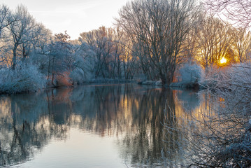 A river in the early winter morning during colorful sunrise