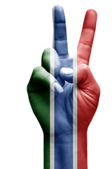 and making victory sign, Gambia painted with flag as symbol of victory, win, success - isolated on white background