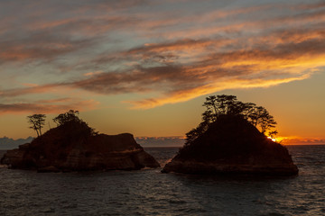 Fototapeta premium 西伊豆堂ヶ島の夕日と夕焼け