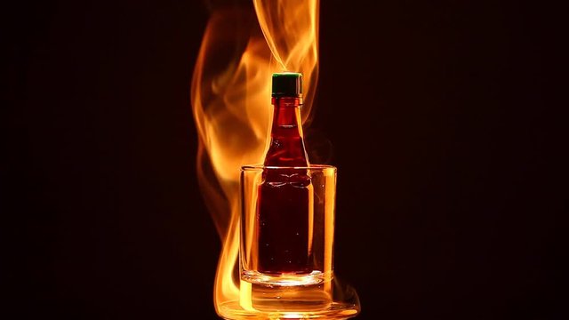 glass shot alcohol bottle smoke dark background hd footage 