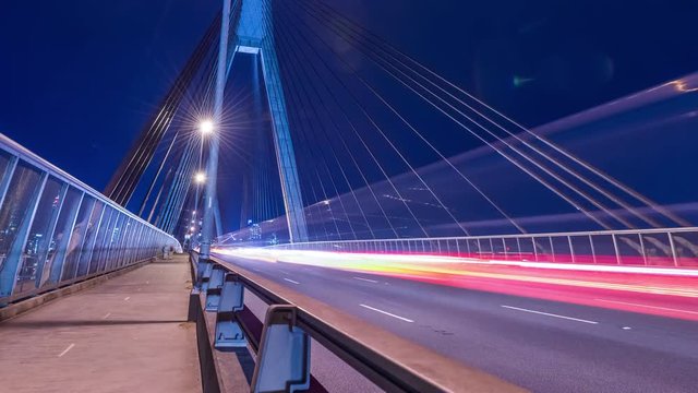 Long exposure time lapse footage with sliding effect of a busy road on Anzac Bridge, Sydney, Australia