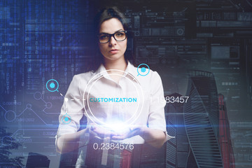 The concept of business, technology, the Internet and the network. A young entrepreneur working on a virtual screen of the future and sees the inscription: Customization