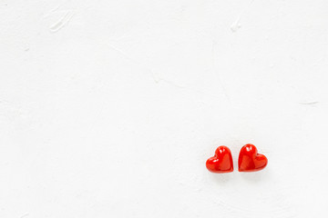 Two red hearts on white background.Valentines Day concept.Top view.Copy space.