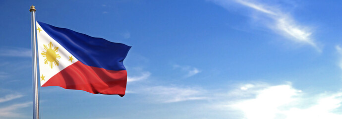 Flag of Philippines rise waving to the wind with sky in the background