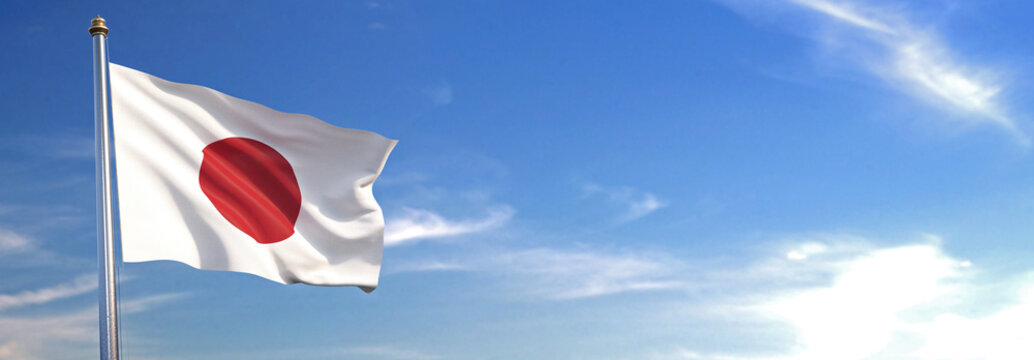 Flag of Japan rise waving to the wind with sky in the background