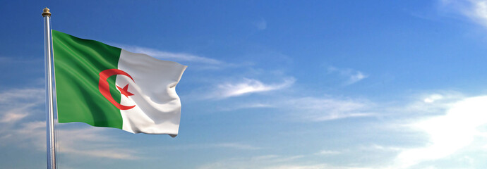 Flag of Argelia rise waving to the wind with sky in the background