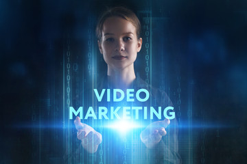Fototapeta na wymiar The concept of business, technology, the Internet and the network. A young entrepreneur working on a virtual screen of the future and sees the inscription: Video marketing