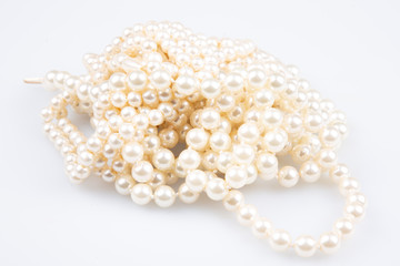 white fashion jewel necklace and bracelet pearl in white background