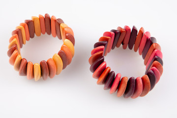 two round wood bracelet colorful red and orange homemade jewelry