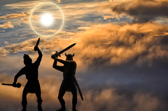 Epic attack of two Old Norse Gods, yellow-brown dramatic curling clouds in the background, shining sun in circle of light above, Norsemen myths, Valhalla, fantasy and vikings themes