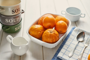 oranges and pumpkins on the table before cooking