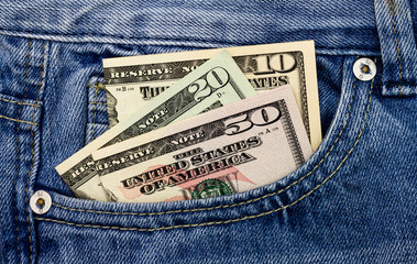 United states dollar in a jeans pocket