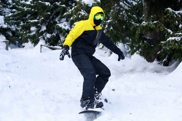 snowboarder in a yellow jacket