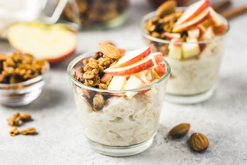 Spiced apple cinnamon overnight oats, healthy breakfast. Selective focus, space for text.