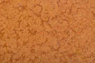 Orange marble with natural pattern texture background.