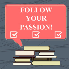 Conceptual hand writing showing Follow Your Passion. Business photo text go with Strong interest curiosity or enthusiasm Uneven Pile of Hardbound Books and Rectangular Speech Bubble