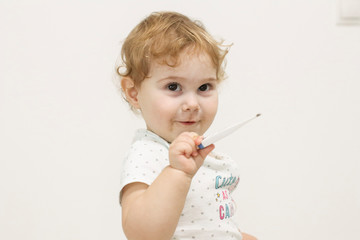 little girl with thermometer