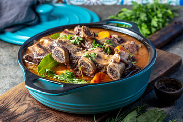 Beef ribs Bourguignon. Beef ribs stewed with carrot, onion in red wine. France dish