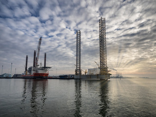 Fototapeta na wymiar Platforms in Esbjerg offshore oil harbor in Denmark