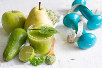 Smoothie fresh fruits dumbell  and young sprouts healthy life style food fitness concept