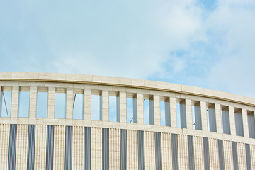 White roof of football building against the sky.