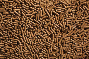 Animal food pellets. Background texture