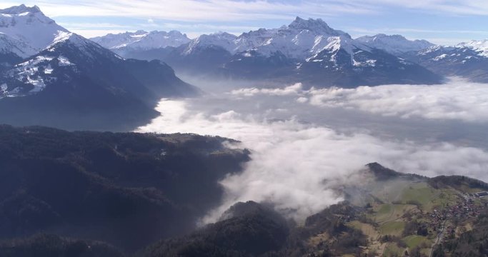 Chablais in fog frontal traveling - Aerial 4K