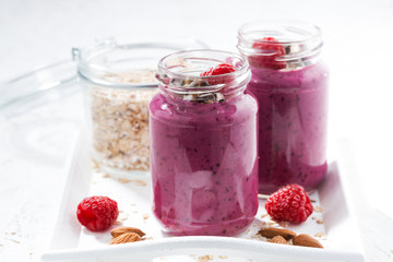 raspberry smoothie with oatmeal and chocolate, closeup
