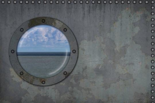 Ship metal porthole with ocean view. Vintage background with copy space.