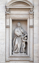 Fototapeta premium Saint Cajetan statue on the portal of Sant Andrea della Valle Church in Rome, Italy 