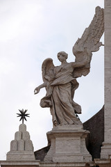 Angel on the portal of Sant Andrea della Valle Church in Rome, Italy 