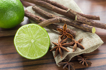 licorice root, lemon and anise on the table