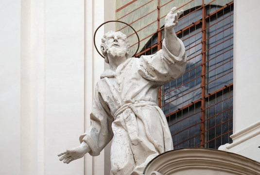Stucco statue of St Francis Receiving the Stigmata on the facade of Santissime Stimmate di San Francesco church, Rome, Italy 
