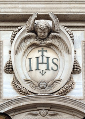 Christogram IHS, facade of the Church of the Gesu, mother church of the Society of Jesus, Rome,...