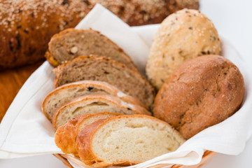 Assorted bakery for display. Bread basket. Selective focus effect.