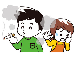 タバコを吸う男性と嫌がる女性