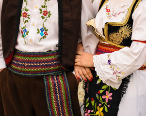 hands of woman in traditional clothes