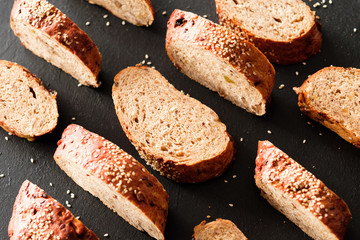 Wholegrain bread slices background. Healthy bakery nutrition.