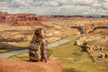 Fototapeta na wymiar Woman travels to America on the Colorado river observation deck