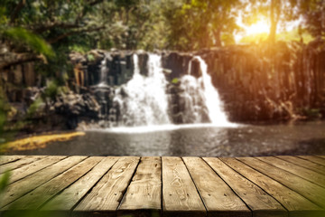 desk of free space and waterfall background 
