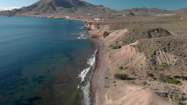 Aerial video of the waves on the beach ON THE MEDITERRANEAN COAST IN CABO DE GATA, SPAIN