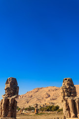 Colossi of Memnon, two massive stone statues of pharaoh Amenhotep III in Luxor, Egypt