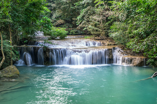 Erawan water fall, tropical rainforest at Srinakarin Dam, Kanchanaburi, Thailand.Erawan water fall is  beautiful waterfall in Thailand. Unseen Thailand - Image