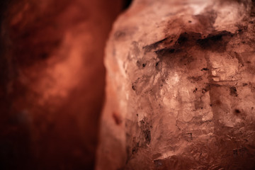 White and pink glowing icy minerals found in an icelandic underwater cave. Beautiful crystal shaped stones , with spiritual meaning. Geology and mining concept for science and jewelry industry. 