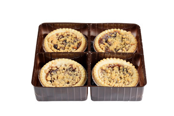  isolated fruit tart with crumble topping in plastic tray