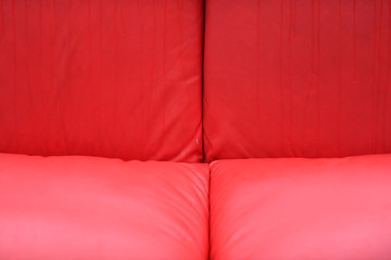 Partial view of a red couch.